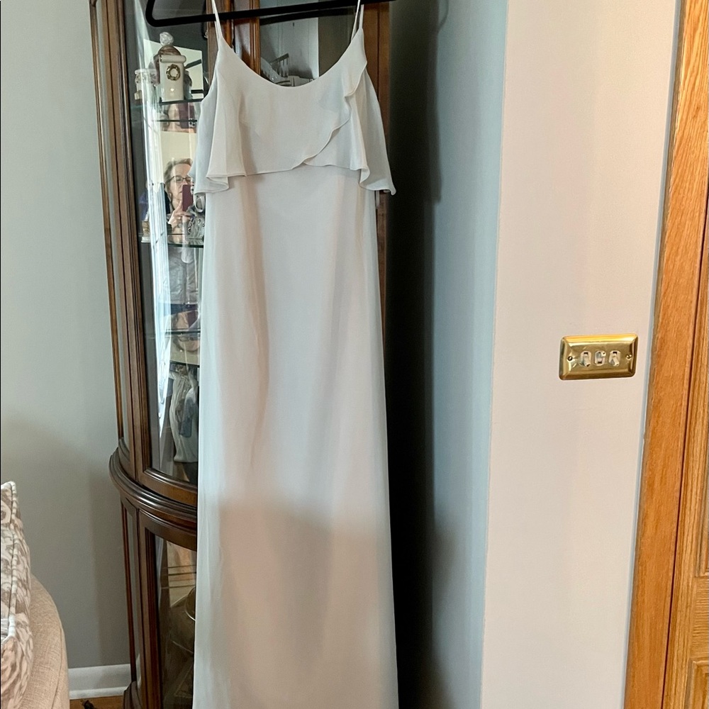 Pale green sweet, &  chiffon with flowy panels. Thin straps with a low V back